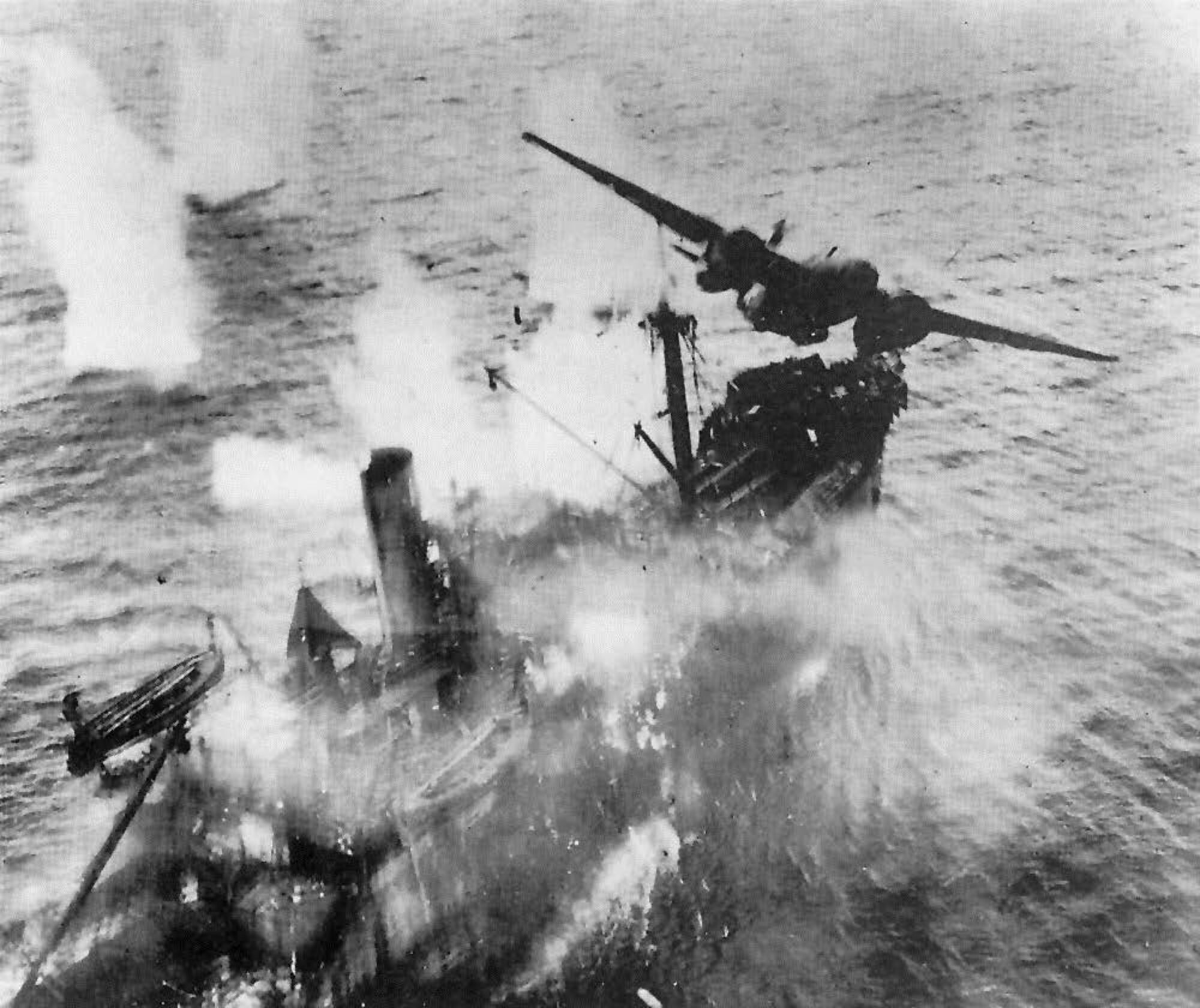 A‐20 from the 3rd Bombardment Group barely hit the mast of a Japanese freighter