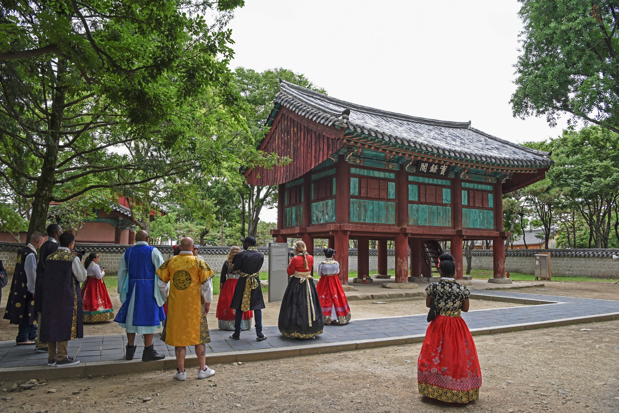 U.S. service members stationed around the Korean Peninsula wear traditional Korean clothing while exploring Jeonju traditional village, Republic of Korea, July 9, 2019. More than 50 Soldiers, Marines and Airmen participated in the three-day tour hosted by the Ministry of National Defense. (U.S. Air Force photo by Staff Sgt. Mackenzie Mendez)