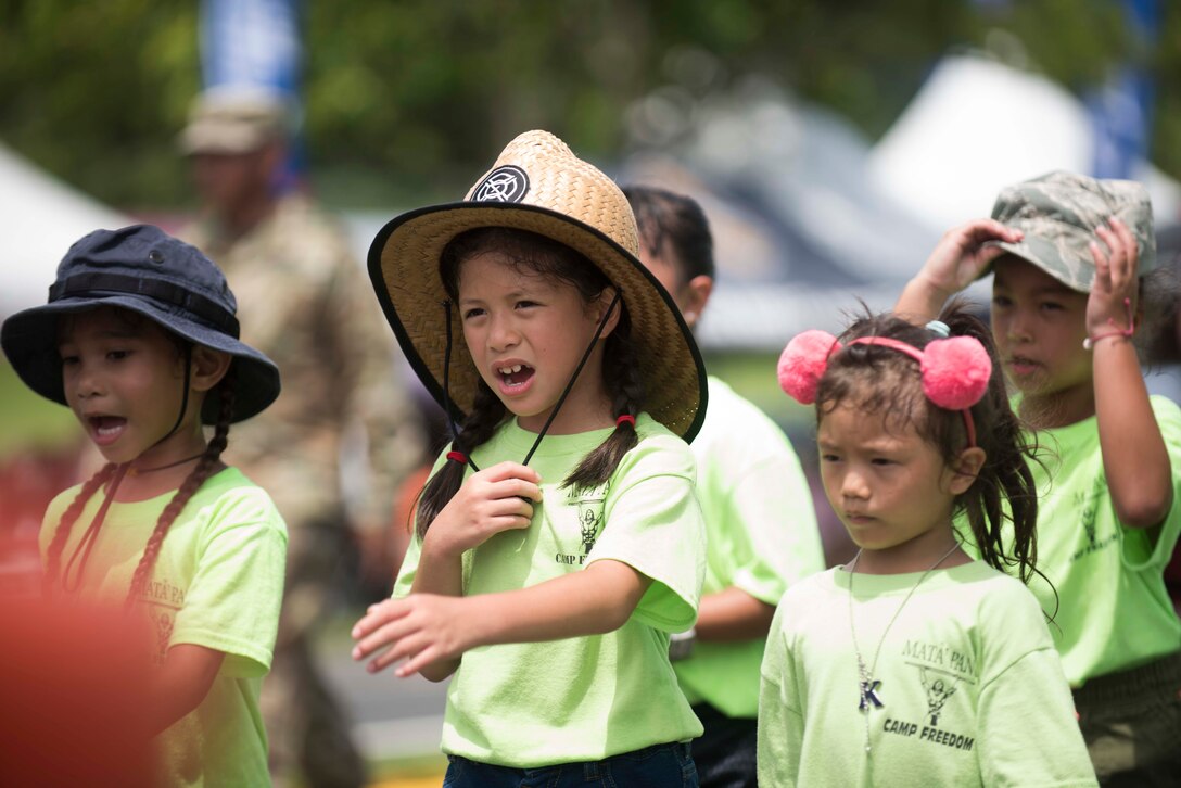 Children with the 15th Annual Camp Freedom flight from Fort Juan Muna in Harmon, march in the 75th Annual Guam Liberation Day Parade July 21, 2019 in Hagatna, Guam.