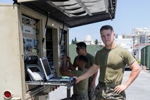 “Compared to my previous unit, 3rd Marine Logistics Group is a close knit community that focuses on MOS proficiency,” said U.S. Marine Corps Cpl. Chandler Sexton while checking communication between frequencies on Camp Kinser, Okinawa, Japan, July 15, 2019. Sexton, a native of Chesapeake, Ohio, works as a satellite operator with Communications Company, Combat Logistics Regiment 37, 3rd Marine Logistics Group.  (U.S. Marine Corps photo by Pfc. Courtney A. Robertson)