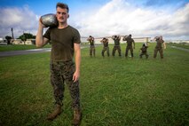 “The best way to come together, is doing the things you really don’t want to do together,” said U.S. Marine Corps Cpl. Ryan Harvey while leading his shop during physical training Camp Kinser, Okinawa, Japan, July 17, 2019. Harvey, a native of Buffalo, New York is a combat graphics specialist with Headquarters Company, Combat Logistics Regiment 37, 3rd Marine Logistics Group. (U.S. Marine Corps photo by Pfc. Courtney A. Robertson)