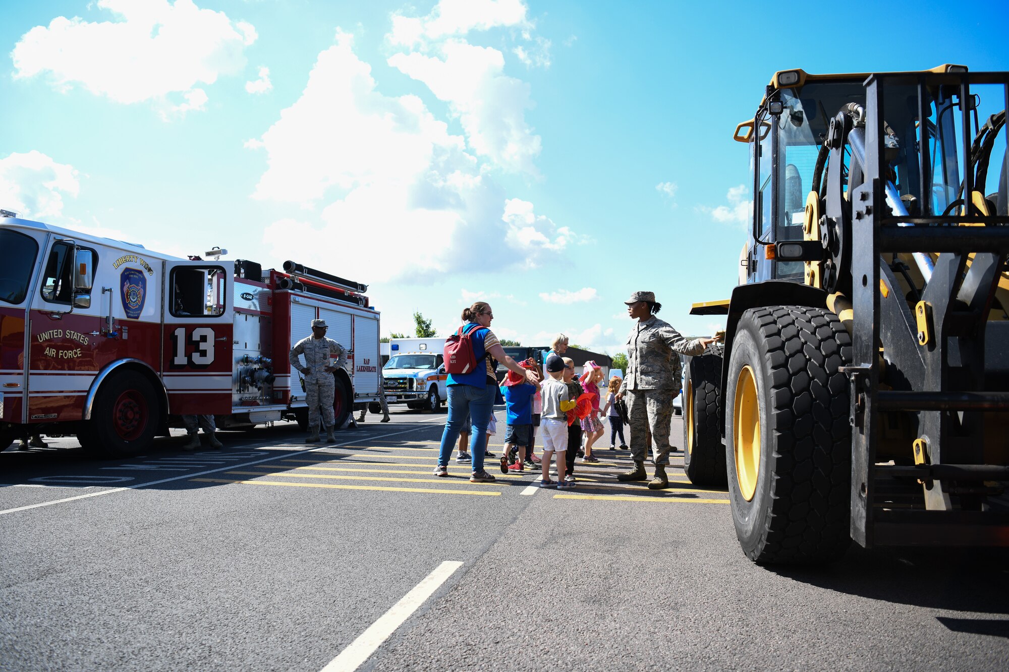 The 48th Logistic Readiness Squadron hosted an interactive vehicle display at Royal Air Force Lakenheath, England, 03 July 2019. 48th LRS displayed transportation and support vehicles, allowing the children to interact with the Airmen who work in transportation and contribute to the nation’s safety and defense. (U.S. Air Force photo by Airman 1st Class Shanice Williams-Jones)