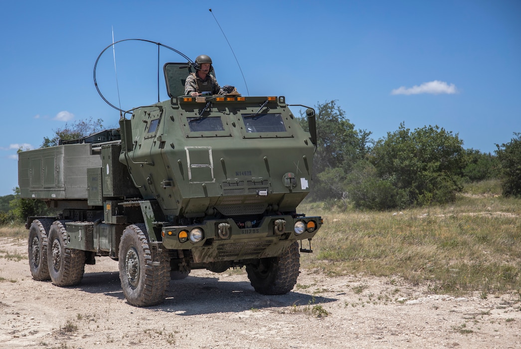 U.S. Marine Cpl. Christian Davis, a High Mobility Rocket System operator with Fox Battery, 2nd Battalion, 14th Marine Regiment, 4th Marine Division, positions as a gunner on a HIMARS during their annual training event Operation Zeus, Fort Hood, Texas, July 18, 2019. Annual training exercises ensure Reserve Marines are proficient and capable of successful integration with their active duty counterparts. (U.S. Marine Corps photo by Cpl. Serine Farahi)