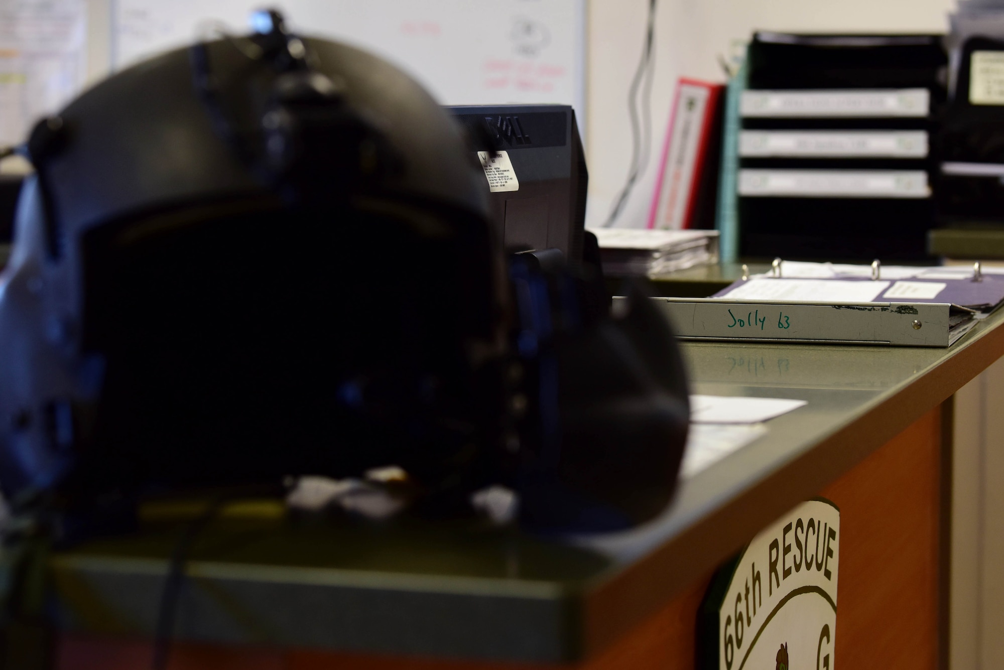 Helicopter gear sits on the 66th Rescue Squadron counter before flight at Nellis Air Force Base, Nevada, July 15, 2019. The 66th RS trains for, and provides, combat search and rescue worldwide. (U.S. Air Force photo by Senior Airman Haley Stevens)