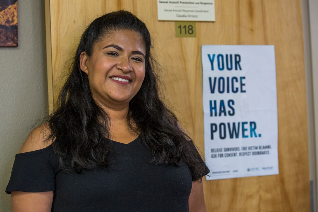 Claudia Orozco, one of the installation Sexual Assault Response Coordinators (SARC), poses for a photo at Marine Corps Air Station (MCAS) Yuma, Ariz., July 22, 2019. Orozco supports and helps sexual assault victims. The 24/7 Support Line is (928)941-3601. (U.S. Marine Corps photo by Cpl. Sabrina Candiaflores)