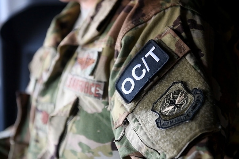 A man wears an OCT patch.