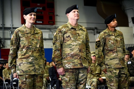 Command team stands at attention during 403rd AFSB change of command ceremony