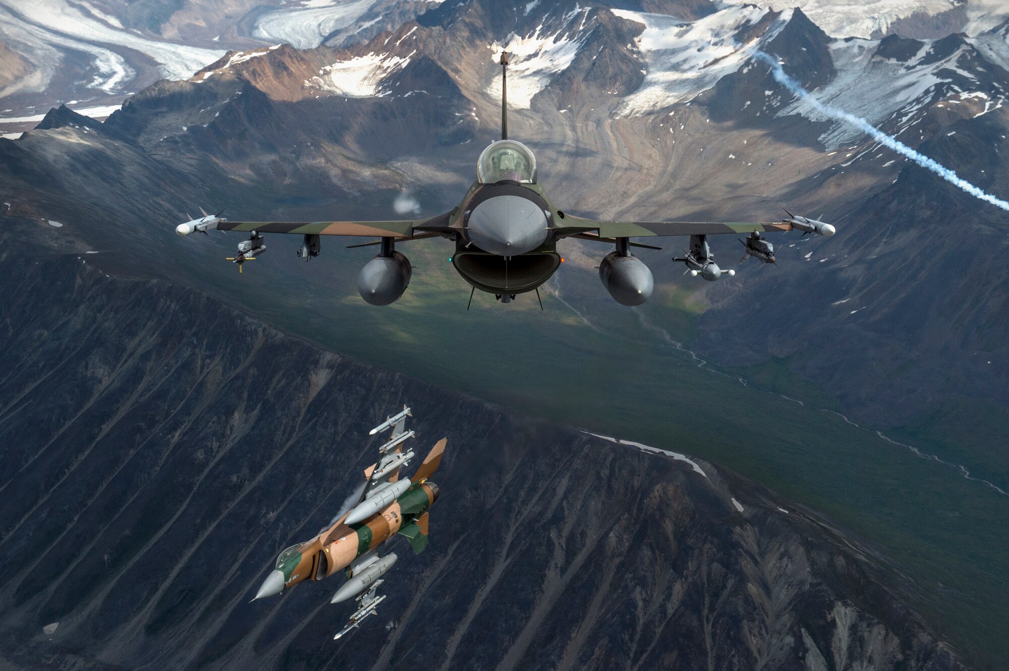 U.S. Air Force F-16 Fighting Falcons from Eielson Air Force Base, fly in formation over the Joint Pacific Alaska Range Complex, July 18, 2019.