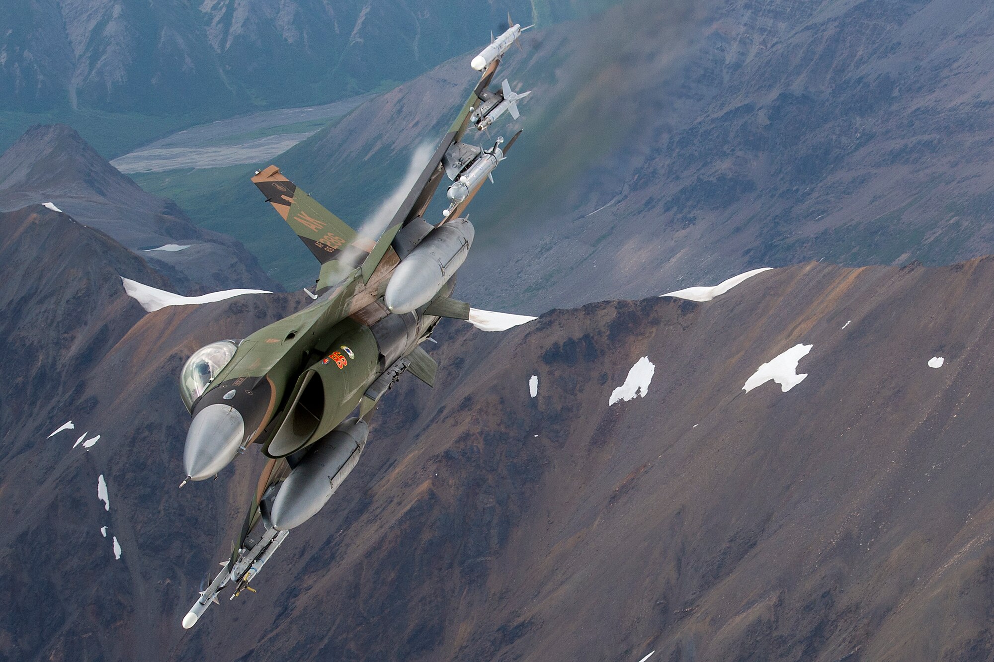 A U.S. Air Force F-16 Fighting Falcon from Eielson Air Force Base, flies in formation over the Joint Pacific Alaska Range Complex, July 18, 2019.