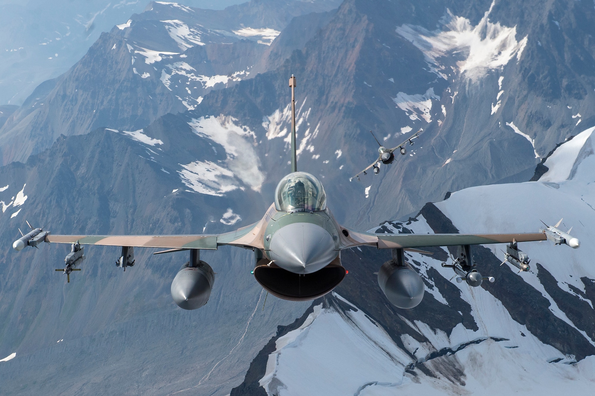 U.S. Air Force F-16 Fighting Falcons from Eielson Air Force Base, fly in formation over the Joint Pacific Alaska Range Complex, July 18, 2019.