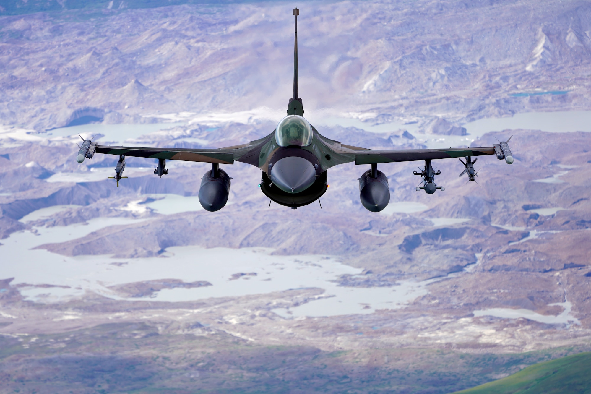 A U.S. Air Force F-16 Fighting Falcon from Eielson Air Force Base, flies in formation over the Joint Pacific Alaska Range Complex, July 18, 2019.