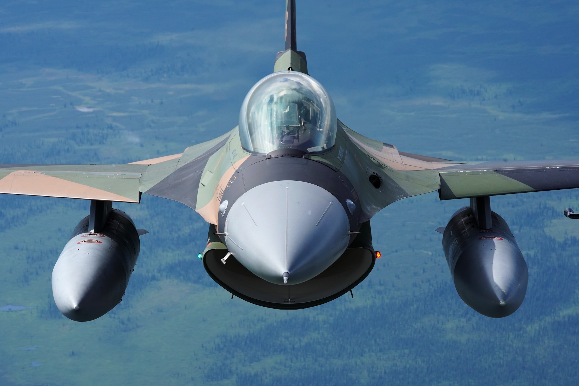 A U.S. Air Force F-16 Fighting Falcon from Eielson Air Force Base, flies in formation over the Joint Pacific Alaska Range Complex, July 18, 2019.