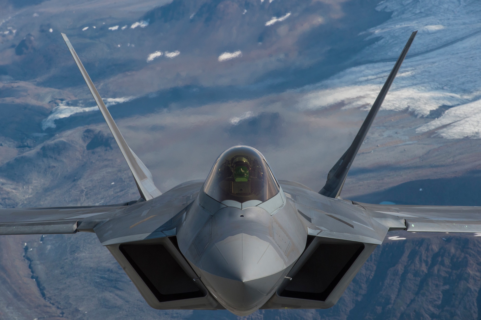A U.S. Air Force F-22 Raptor from Joint Base Elmendorf-Richardson, flies in formation over the Joint Pacific Alaska Range Complex, July 18, 2019.