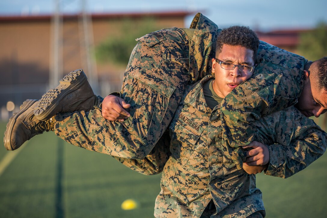 U.S. Marines assigned to Headquarters and Headquarters Squadron (H&HS) conduct H&HS's first Combat Fitness Test (CFT) of the year at Marine Corps Air Station Yuma, Ariz., July 17, 2019. A CFT is composed of an 880-yard sprint, lifting an ammunition can overhead repeatedly for two minutes, and performing a timed event, the maneuver-under-fire, in which Marines conduct combat-related tasks. (U.S. Marine Corps photo by Cpl. Sabrina Candiaflores)