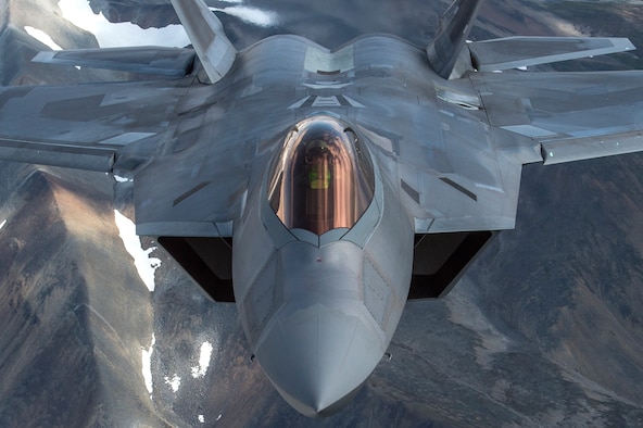 U.S. Air Force F-22 Raptors from Joint Base Elmendorf-Richardson, fly in formation over the Joint Pacific Alaska Range Complex, July 18, 2019.