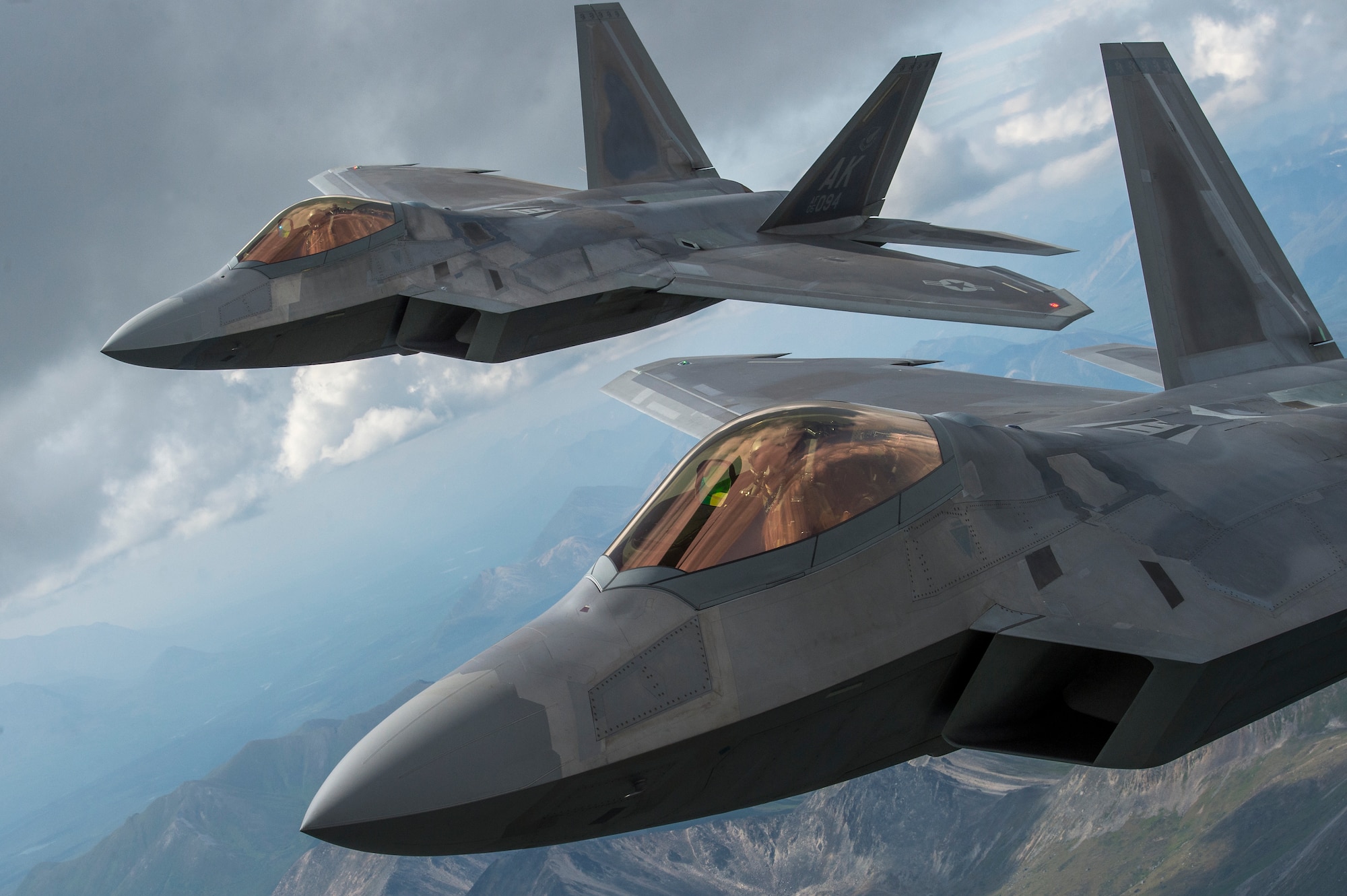 U.S. Air Force F-22 Raptors from Joint Base Elmendorf-Richardson, fly in formation over the Joint Pacific Alaska Range Complex, July 18, 2019.