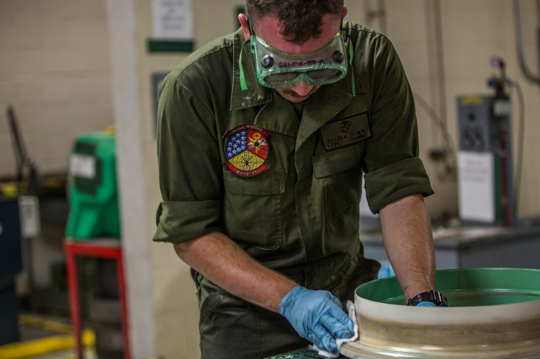 U.S. Marine Corps Lance Cpl. Billie Scott and Lance Cpl. Justin Stargell, aircraft maintenance specialists assigned to Marine Aviation Squadron (MALS) 13, break down multiple F-35B Lightning ll tires to be cleaned for their tire inspection at Marine Corps Air Station (MCAS) Yuma, Ariz., July 17, 2019. The MALS-13 Tire Shop inspects every tire they receive to ensure they are still good to use. (U.S. Marine Corps photo by Cpl. Sabrina Candiaflores)