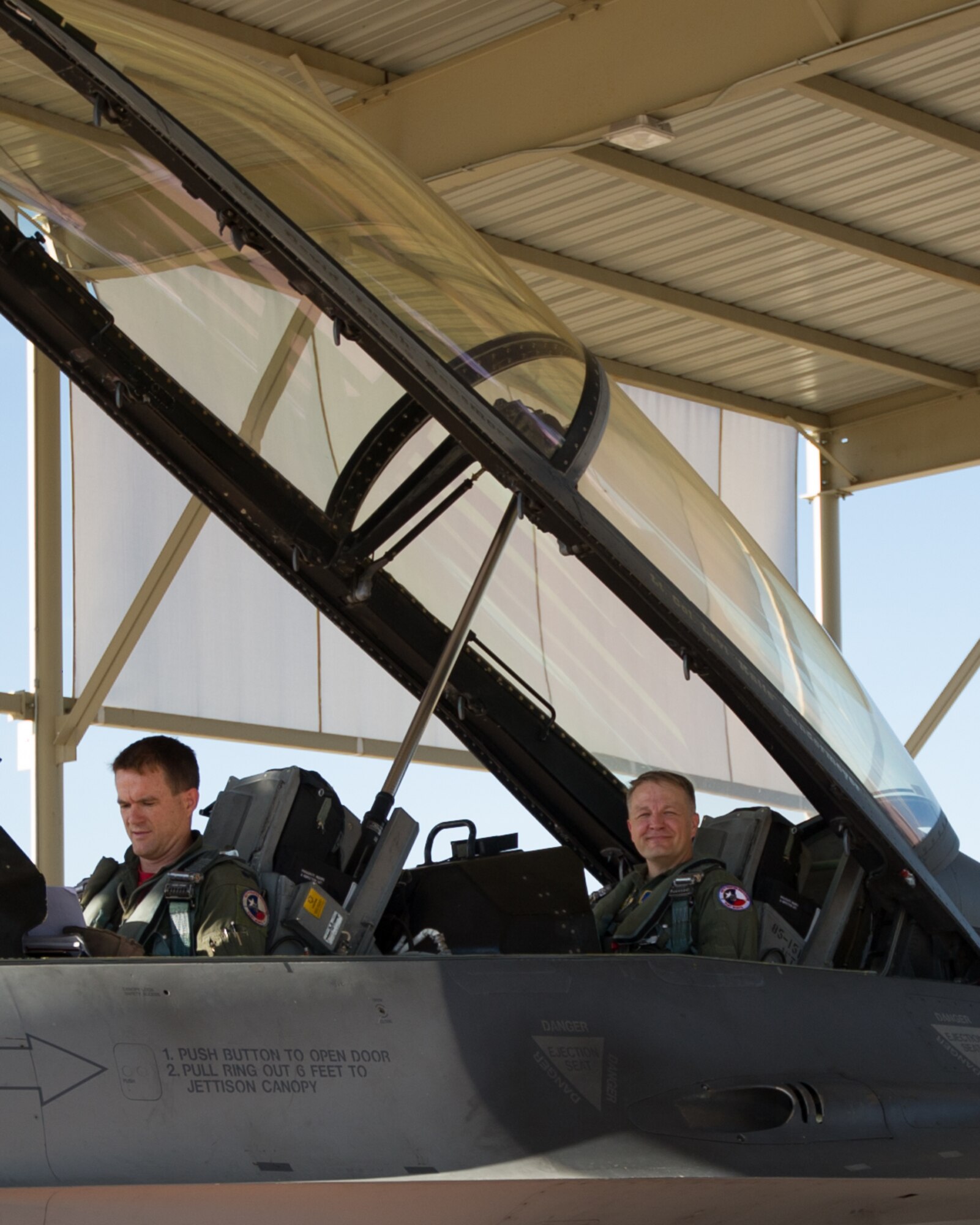 Lt. Col. Kenneth Seiver, a 457th Fighter Squadron F-16 pilot, completes a familiarization flight for Chief Master Sgt. James Loper, 10th Air Force command chief, at Naval Air Station Fort Worth Joint Reserve Base, Texas on July 12, 2019. The flight gave Loper a hands-on understanding of the jet's capabilities and the squadron’s mission. (U.S. Air Force photo by Senior Airman Randall Moose)