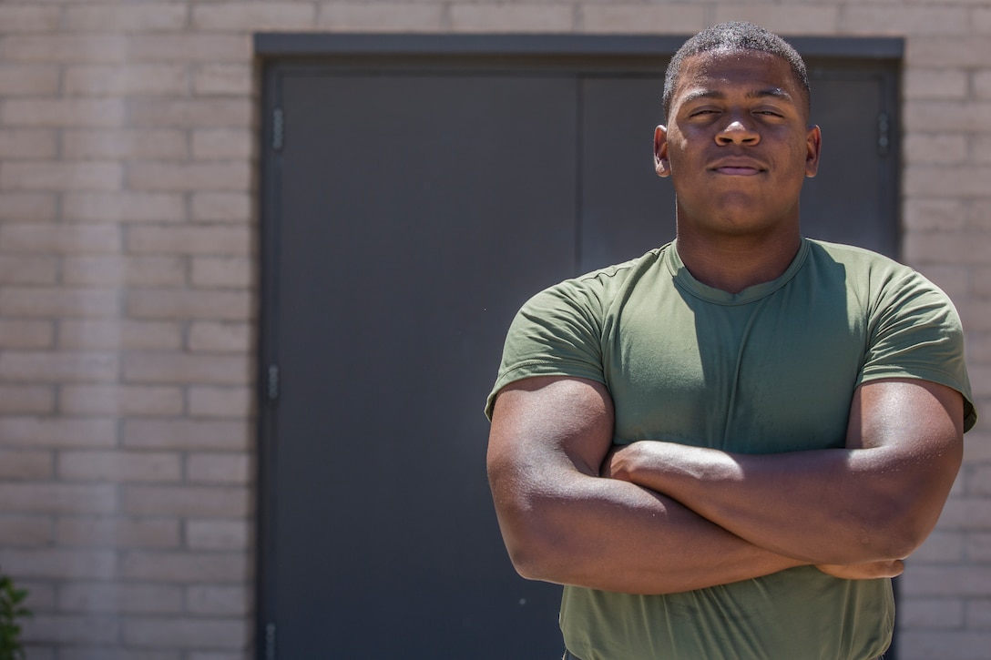 U.S. Marine Corps Lance Cpl. Ghaad Jones, an aircraft maintenance administration specialist assigned to Marine Aviation Logistics Squadron (MALS) 13, repeatedly lifts an ammunition can on his break to prepare for the Combat Fitness Test (CFT). Marines must conduct a CFT every year to ensure they are physically ready for combat situations. (U.S. Marine Corps photo by Cpl. Sabrina Candiaflores)