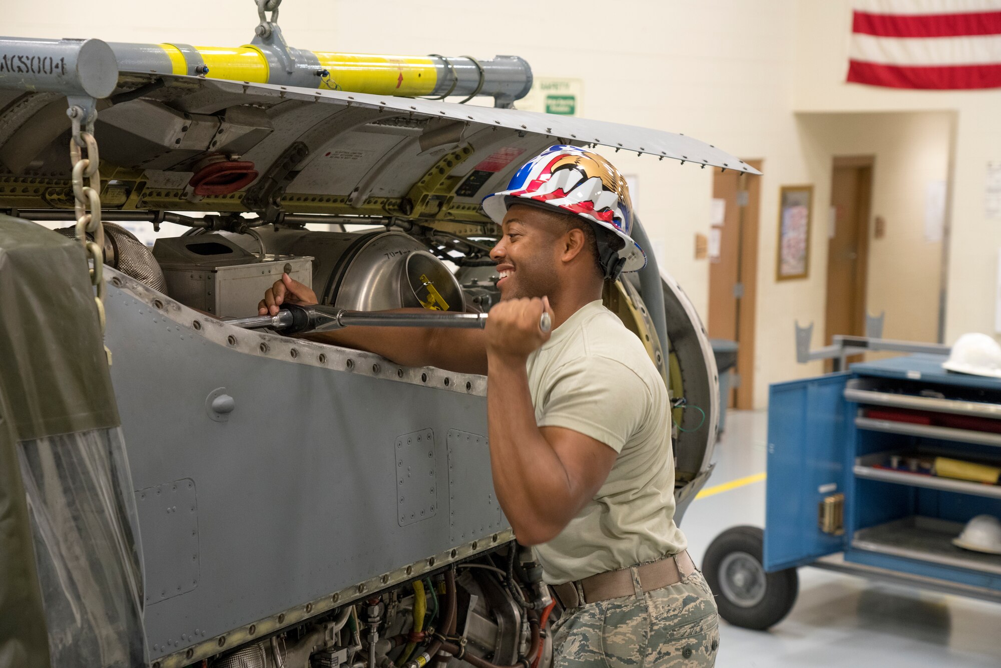 Staff Sgt. Robert Ricks, 403rd Aircraft Maintenance Squadron aerospace propulsion craftsman, secures a bolt on the engine bag in preparation for transportation July 14, 2019 at Keesler Air Force Base, Mississippi. The engine is placed in a shipment bag prior to transportation so it is protected from the elements. (U.S. Air Force photo by Tech. Sgt. Christopher Carranza)