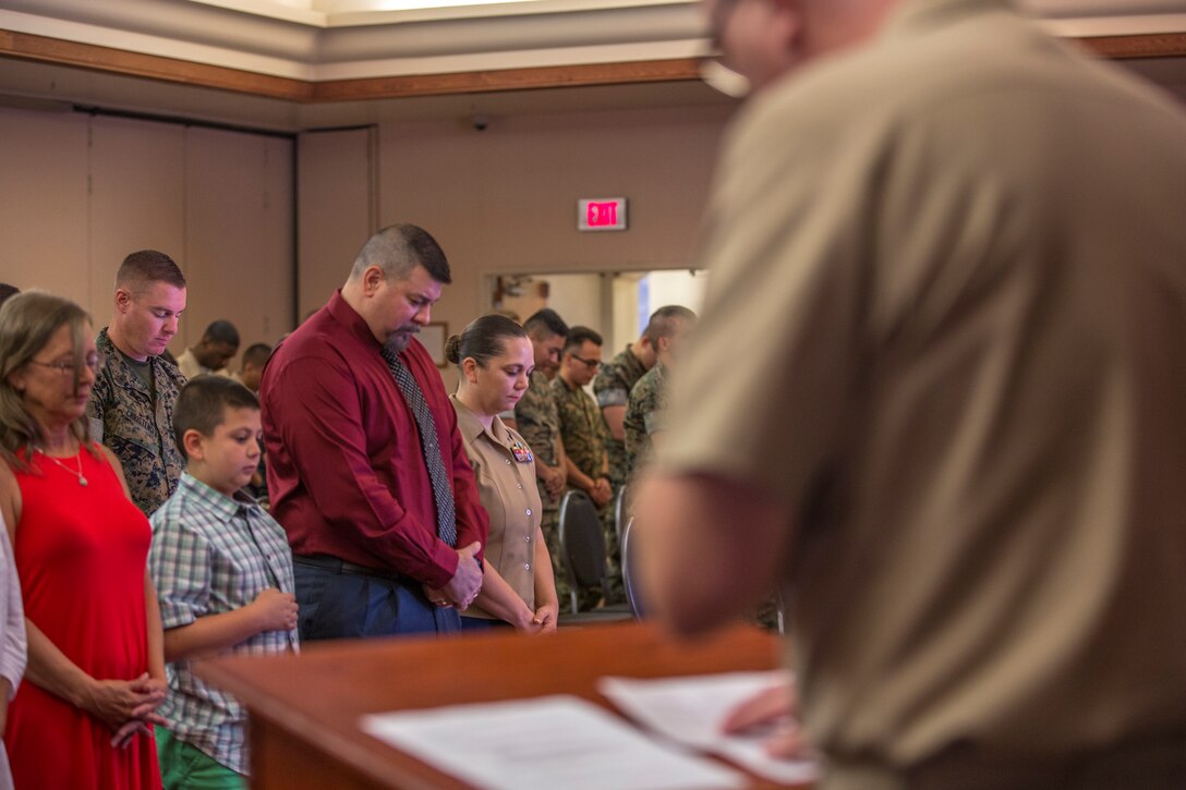 U.S. Marine Corps Staff Sgt. Nicole Showman retires after 20 years of service at the Sonoran Pueblo on Marine Corps Air Station Yuma, Ariz., July 12, 2019. Showman also received a Navy-Marine Corps Achievment Medal for her superior performance as the Headquarters and Headquarters Squadron Career Planner from June 2018 to July 2019. (U.S. Marine Corps photo by Cpl. Sabrina Candiaflores)