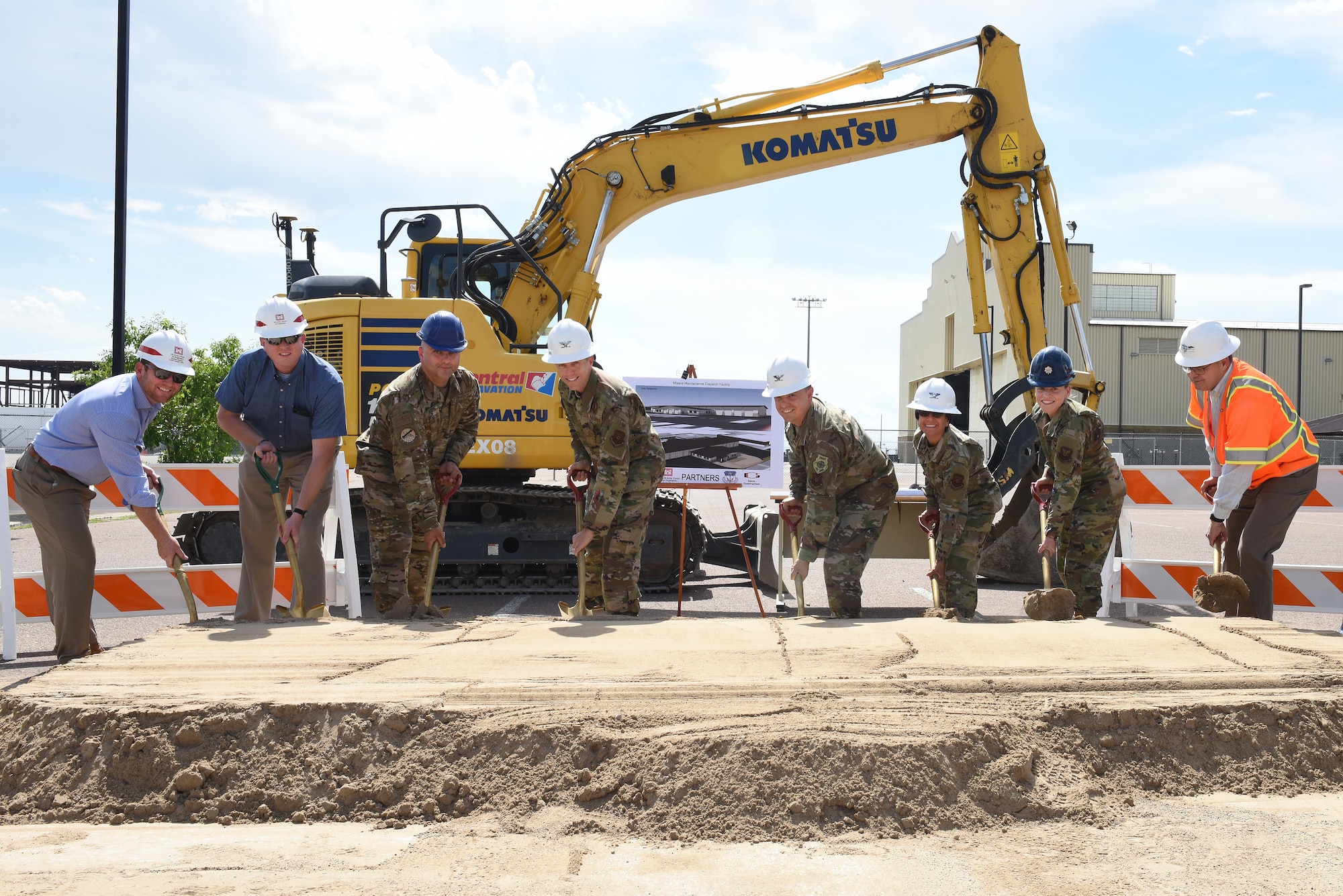 Members of base leadership, project partners and contractors participate in a groundbreaking ceremony July 23, 2019, at Malmstrom Air Force Base, Mont.