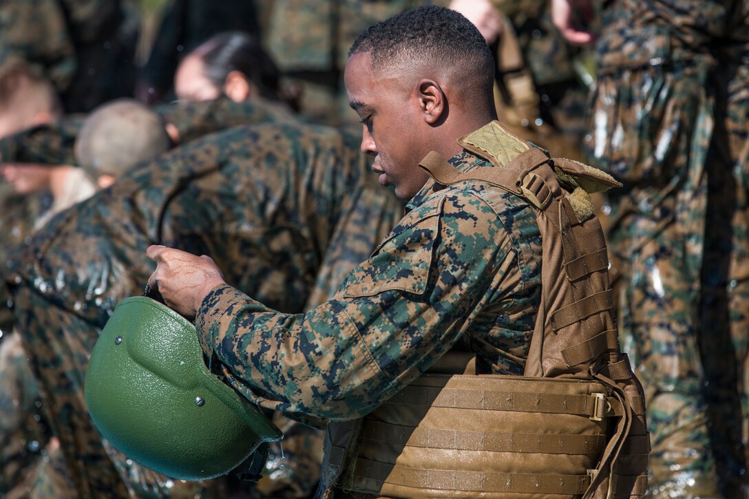 U.S. Marines stationed at Marine Corps Air Station (MCAS) Yuma conduct their swim qualification at the Oasis Pool on MCAS Yuma, Ariz., July 10, 2019. The swim qualification is designed to reduce fear, raise self-confidence, and develop Marines with the ability to survive in water. (U.S. Marine Corps photo by Cpl. Sabrina Candiaflores)