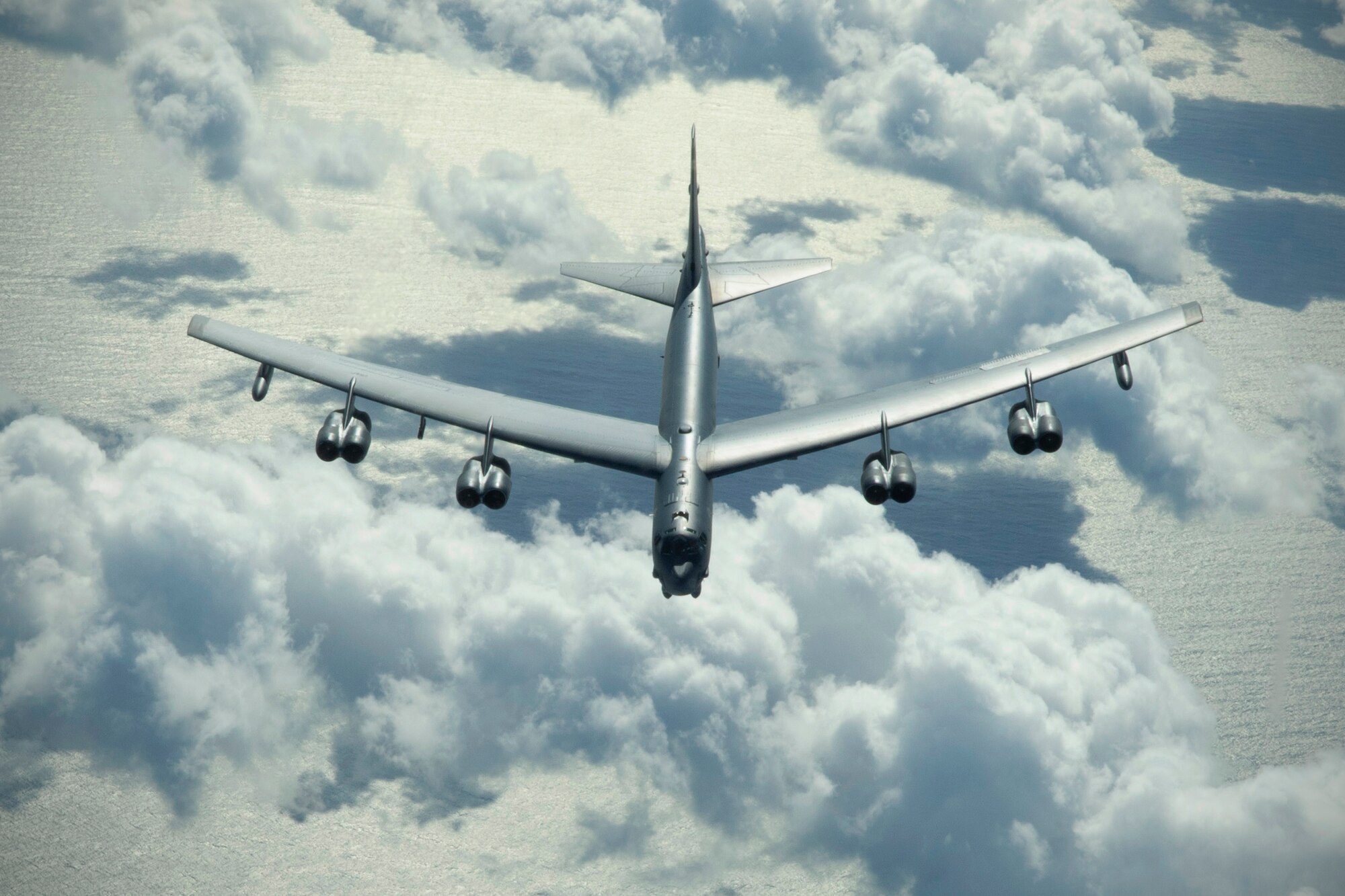 A U.S. Air Force B-52 Stratofortress flies over the Pacific Ocean July 14, near the coast of Brisbane, Australia, after being refueled by a USAF KC-10 Extender in support of Exercise Talisman Sabre 19. The Stratofortress and Extender were some of several aircraft used during TS19, alongside other USAF and RAAF airborne warning and control system aircraft, refuelers, tankers and bombers.(U.S. Air Force photo by Senior Airman Elora J. Martinez)