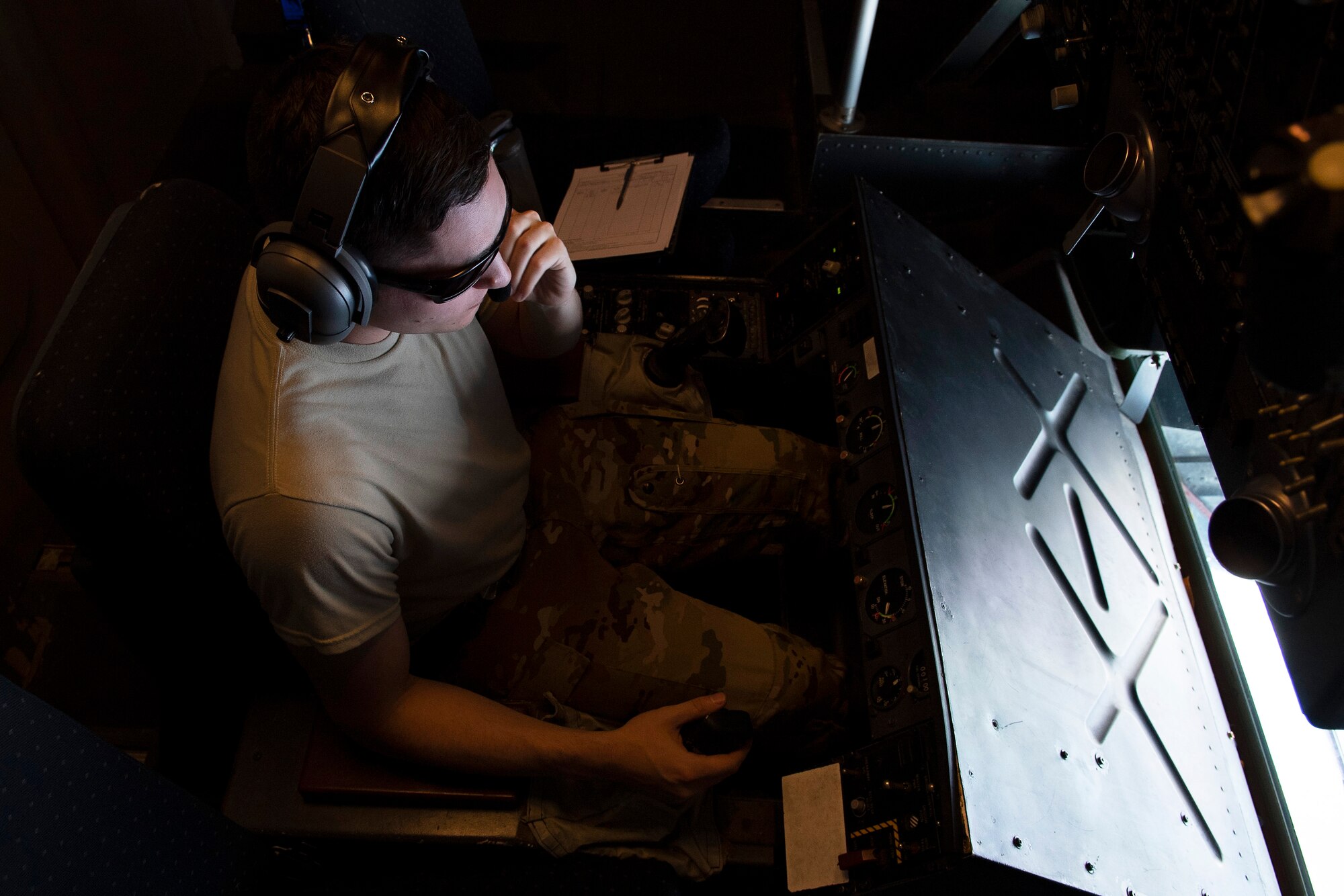 U.S. Air Force Senior Airman William Hulse, 2nd Air Refueling Squadron, Joint Base McGuire-Dix-Lakehurst, New Jersey, prepares to fuel a USAF F-22 Raptor July 14, over the Pacific Ocean near the coast of Brisbane, Australia, in support of Exercise Talisman Sabre 19. The Raptor was one of several aircraft used during TS19,  alongside other USAF and RAAF airborne warning and control system aircraft, refuelers, tankers and bombers. (U.S. Air Force photo by Senior Airman Elora J. Martinez)