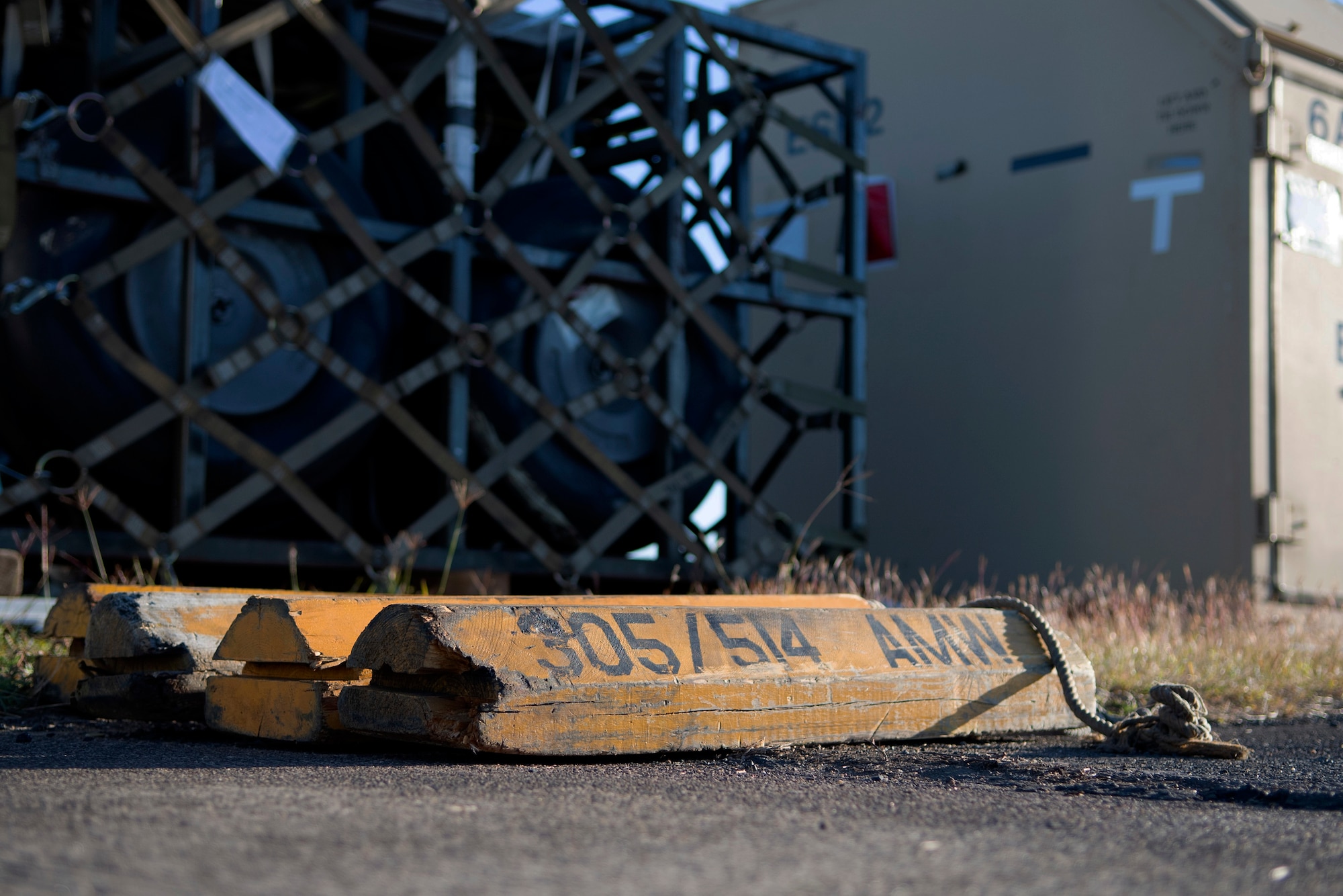 Aircraft chocks belonging to the 305th Air Maintenance Squadron, Joint Base McGuire-Dix-Lakehurst, New Jersey, are stowed off the flightline after being pulled from a U.S. Air Force KC-10 Extender prior to its departure July 16, from Brisbane International Airport, Australia, in support of Exercise Talisman Sabre 19. The Extender arrived July 12 to support major air operations for USAF, Royal Australian Air Force and U.S. Navy aircraft operating out of RAAF Base Amberley for TS19. (U.S. Air Force photo by Senior Airman Elora J. Martinez)