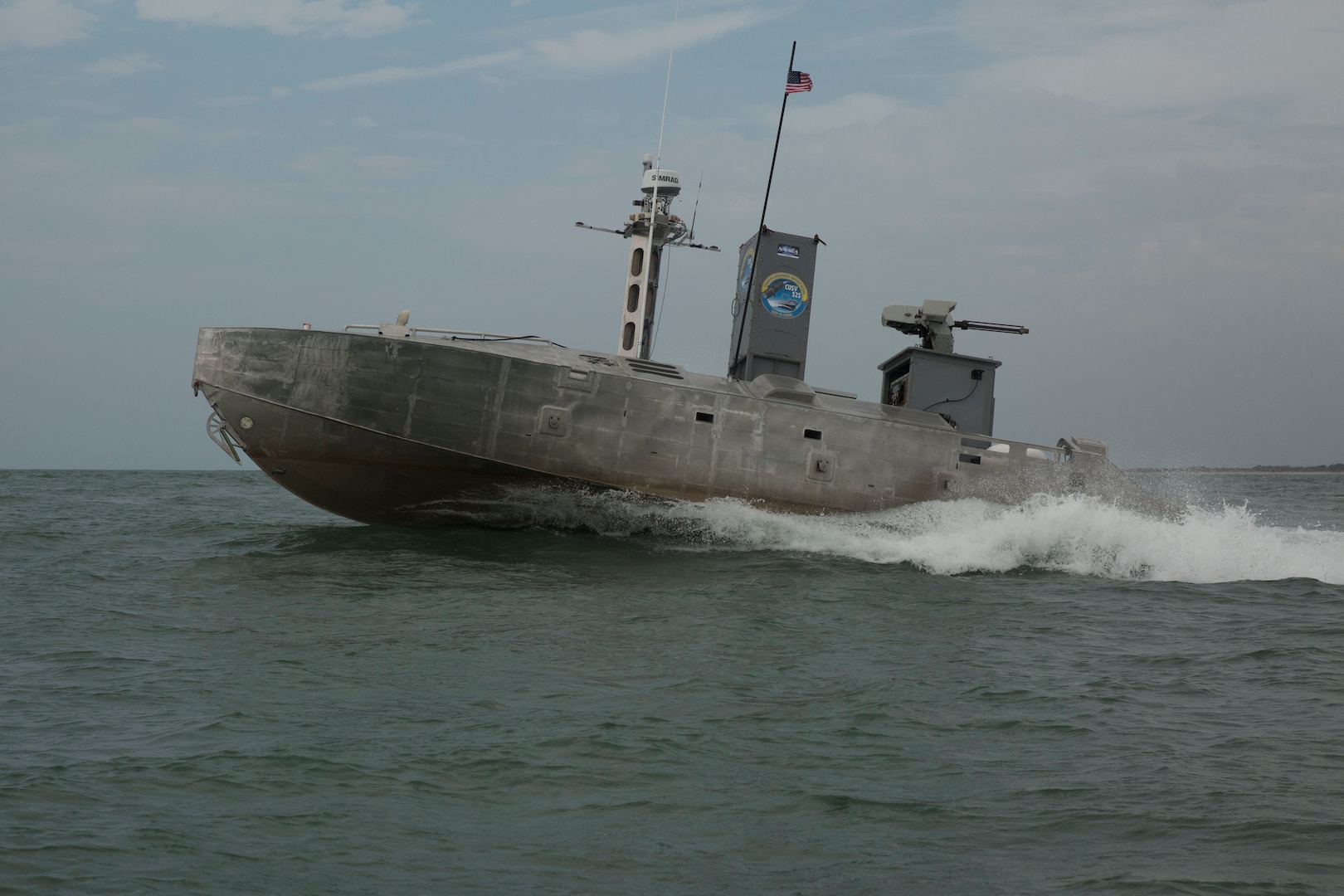 An Expeditionary Warfare Unmanned Surface Vessel autonomously navigates a predetermined course through the water during Advanced Naval Technology Exercise 2019 at Camp Lejeune, N.C. July 12, 2019. ANTX East 2019 is an event designed to test new technology with acedemic, industry and Navy participants. (Marine Corps photo by LCpl. Nicholas Guevara)