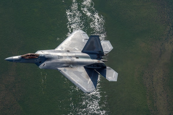 A U.S. Air Force F-22 Raptor from Joint Base Elmendorf-Richardson, flies in formation over the Joint Pacific Alaska Range Complex, July 18, 2019.