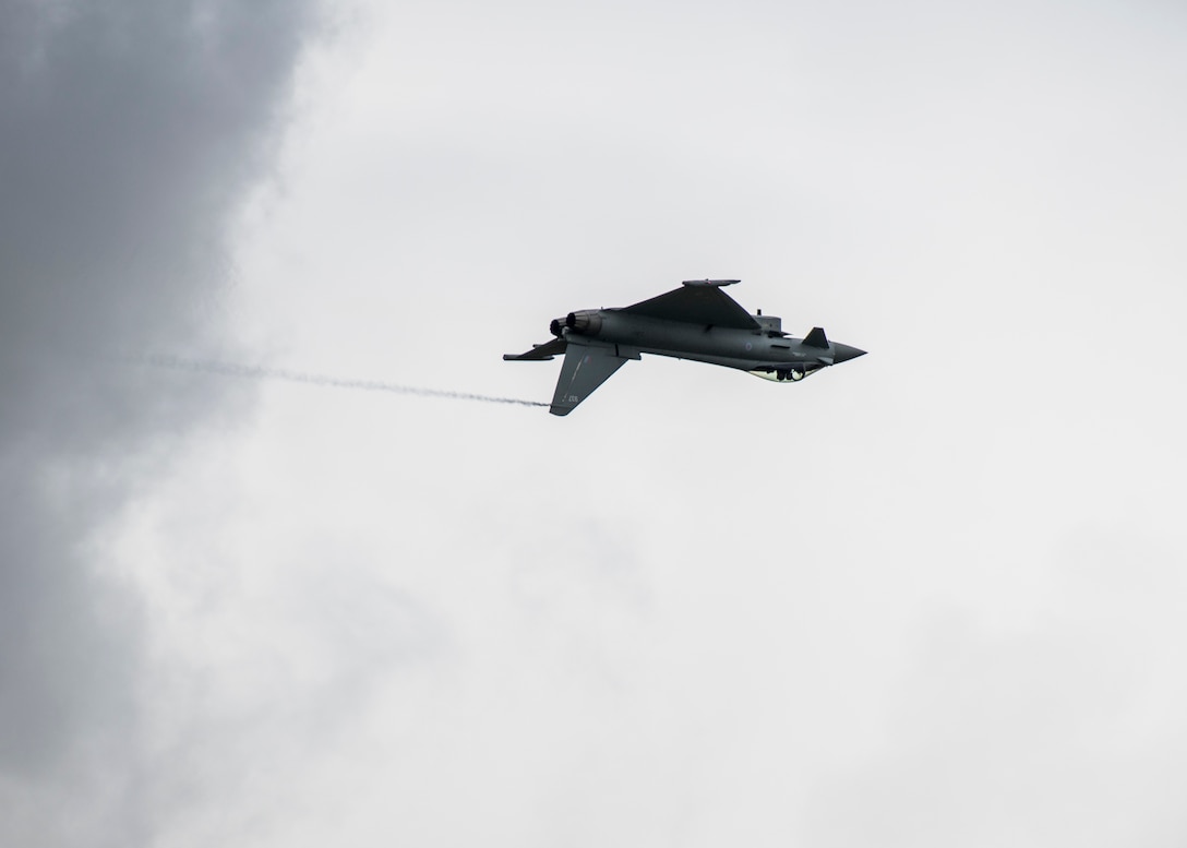 An Italian Air Force Eurofighter F-2000 Typhoon flies past the audience during the 2019 Royal International Air Tattoo at RAF Fairford, England, July 20, 2019. This year, RIAT commemorated the 70th anniversary of NATO and highlighted the United States' enduring commitment to its European allies. (U.S. Air Force photo by Airman 1st Class Jennifer Zima)