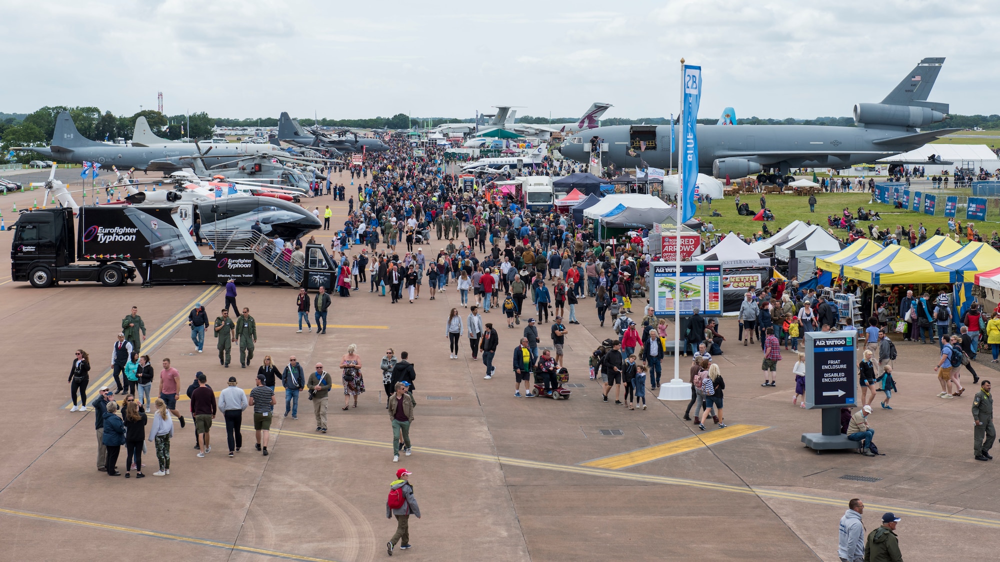 Thousands of attendees view static displays of NATO aircraft during the 2019 Royal International Air Tattoo at RAF Fairford, England, July 20, 2019. This year’s RIAT commemorated the 70th Anniversary of NATO and highlighted the United State’s enduring commitment to its European allies. (U.S. Air Force photo by Airman 1st Class Jennifer Zima)