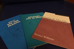 Reading material sits on a table at the mental health treatment facility, July 18, 2019, at Incirlik Air Base, Turkey. These books, along with other educational information, are provided by the Alcohol and Drug Abuse Prevention and Treatment clinic to educate Airmen on healthy and responsible drinking habits. (U.S. Air Force photo by Staff Sgt. Matthew J. Wisher)