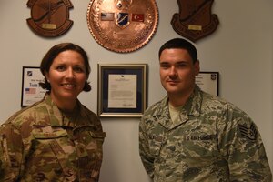 U.S. Air Force Maj. Candee Berck, 39th Medical Operations Squadron Alcohol and Drug Abuse Prevention and Treatment program manager, left, and Staff Sgt. Aidan Vela, 39th MDOS mental health technician, pose for a photo, July 18, 2019, at Incirlik Air Base, Turkey. ADAPT is one of the entities that fall under the mental health flight and is in place as a preventative and rehabilitative program to get Airmen focused on their mission. (U.S. Air Force photo by Staff Sgt. Matthew J. Wisher)