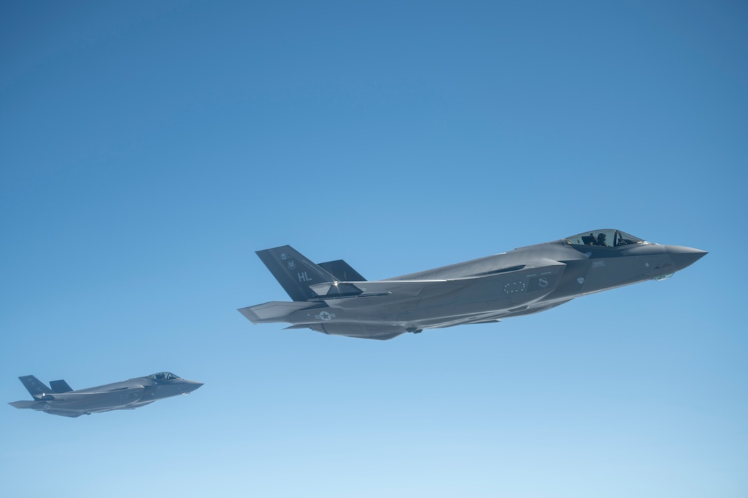 U.S. Air Force F-35A Lightning II aircraft  assigned to the 388th Fighter Wing, Hill Air Force Base, Utah, wait to receive fuel from a KC-135 Stratotanker assigned to the 351st Air Refueling Squadron, RAF Mildenhall, England, during Operation Rapid Forge over Germany, July 23, 2019.  Rapid Forge aircraft are forward deploying to bases in the territory of NATO allies. Participation in multinational operations enhances the U.S. Air Force’s professional relationship with partner militaries. (U.S. Air Force photo by Tech. Sgt. Emerson Nuñez)