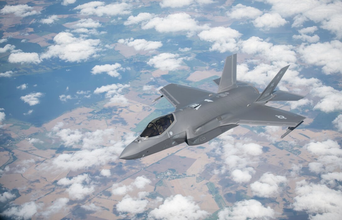 A U.S. Air Force F-35A Lightning II assigned to the 388th Fighter Wing, Hill Air Force Base, Utah, flies away from a KC-135 Stratotanker assigned to the 351st Air Refueling Squadron, RAF Mildenhall, England, after receiving fuel during Operation Rapid Forge over Germany, July 23, 2019. Participation in multinational operations and operations like Rapid Forge enhances professional relationships and improves coordination between allies. (U.S. Air Force photo by Tech. Sgt. Emerson Nuñez)
