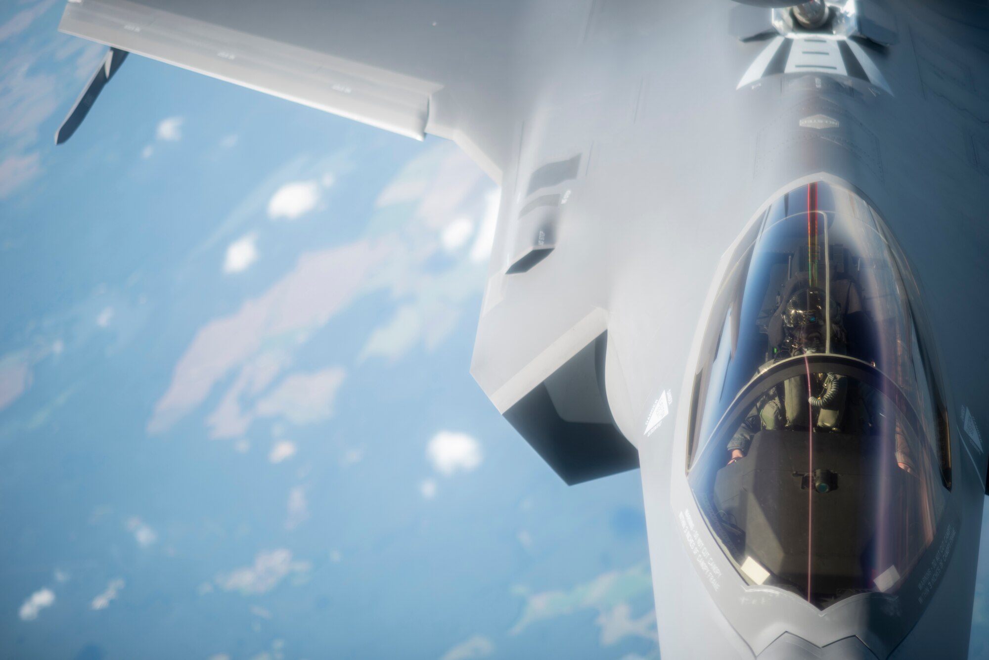 A U.S. Air Force F-35A Lightning II assigned to the 388th Fighter Wing, Hill Air Force Base, Utah, receives fuel from a KC-135 Stratotanker assigned to the 351st Air Refueling Squadron, RAF Mildenhall, England, during Operation Rapid Forge over Germany, July 23, 2019. Participation in multinational operations and operations like Rapid Forge enhances professional relationships and improves coordination between allies. (U.S. Air Force photo by Tech. Sgt. Emerson Nuñez)