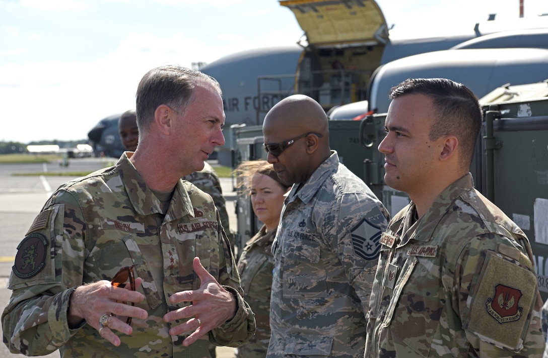 Lt. Gen. Warren Berry, deputy chief of staff for Logistics, Engineering and Force Protection, discusses maintenance efforts with Tech. Sgt. Luis Severin, 100th Maintenance Group member, during a visit to RAF Mildenhall, England, July 22, 2019. During his tour, Berry was shown upgrades to security around base, the latest innovation tools used on the flightline and received briefings on major engineering and logistic projects. (U.S. Air Force photo by Airman 1st Class Brandon Esau)