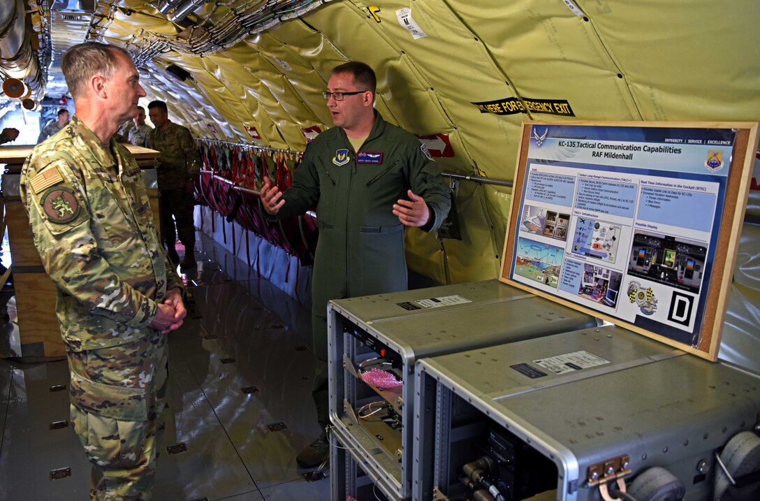 Lt. Gen. Warren Berry, deputy chief of staff for Logistics, Engineering and Force Protection, receives a briefing on KC-135 capabilities from Staff Sgt. Greg Webb, 351st Air Refueling Squadron boom operator, during a visit to RAF Mildenhall, England, July 22, 2019. During his visit, Berry was also shown upgrades to security around base, the latest innovation tools used on the flightline and received briefings on major engineering and logistic projects. (U.S. Air Force photo by Airman 1st Class Brandon Esau)