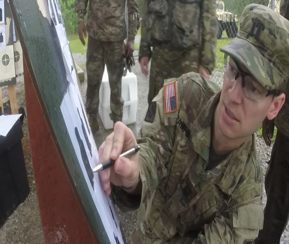 Cpt. Jesse Campbell (412th TEC, G3) scores Postal Match targets