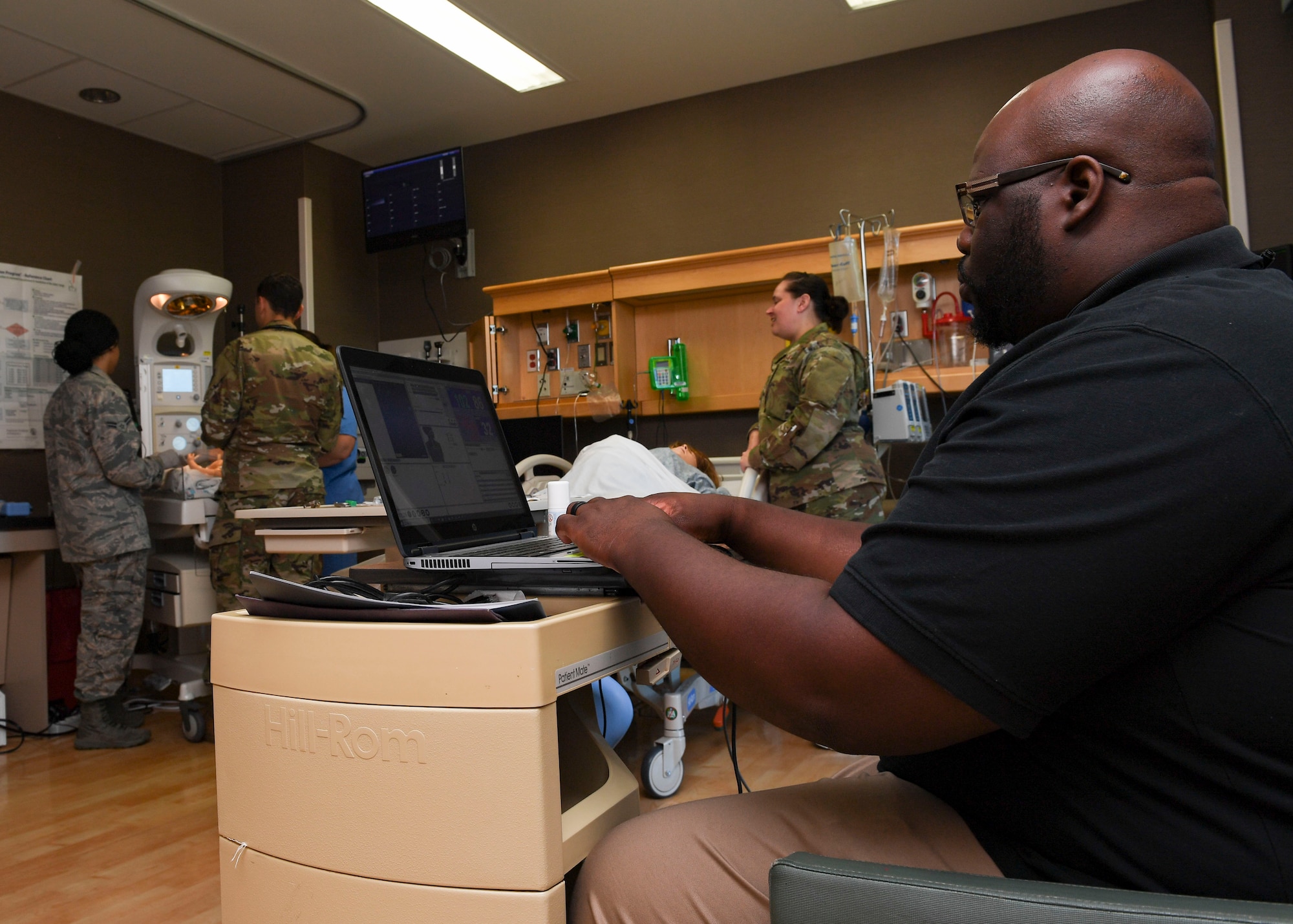 Raymond Jernigan, 633rd Medical Group simulator operator, sets the vitals for a Neonatal Resuscitation Program certification training, July 10, 2019, at Joint Base Langley-Eustis, Virginia.