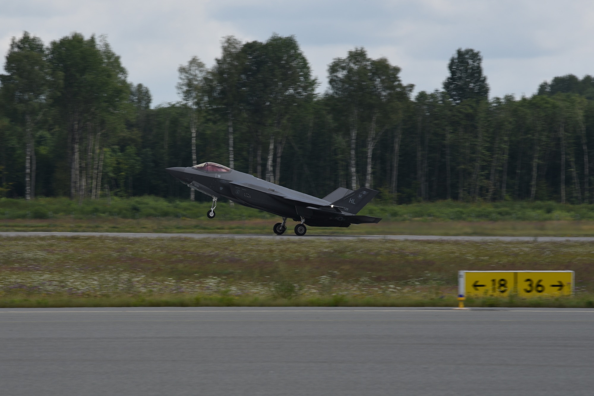 A U.S. Air Force F-35A Lightning II fighter jet deployed from the 388th and 419th Fighter Wings, Hill Air Force Base, Utah, lands on a runway during Operation Rapid Forge at Lielvarde Air Base, Latvia, July, 23, 2019. This is the first time a U.S. Air Force F-35 Lightning II stealth fighter has landed in Latvia. Operation Rapid Forge is intended to enhance interoperability with NATO allies to improve combined operational capabilities.