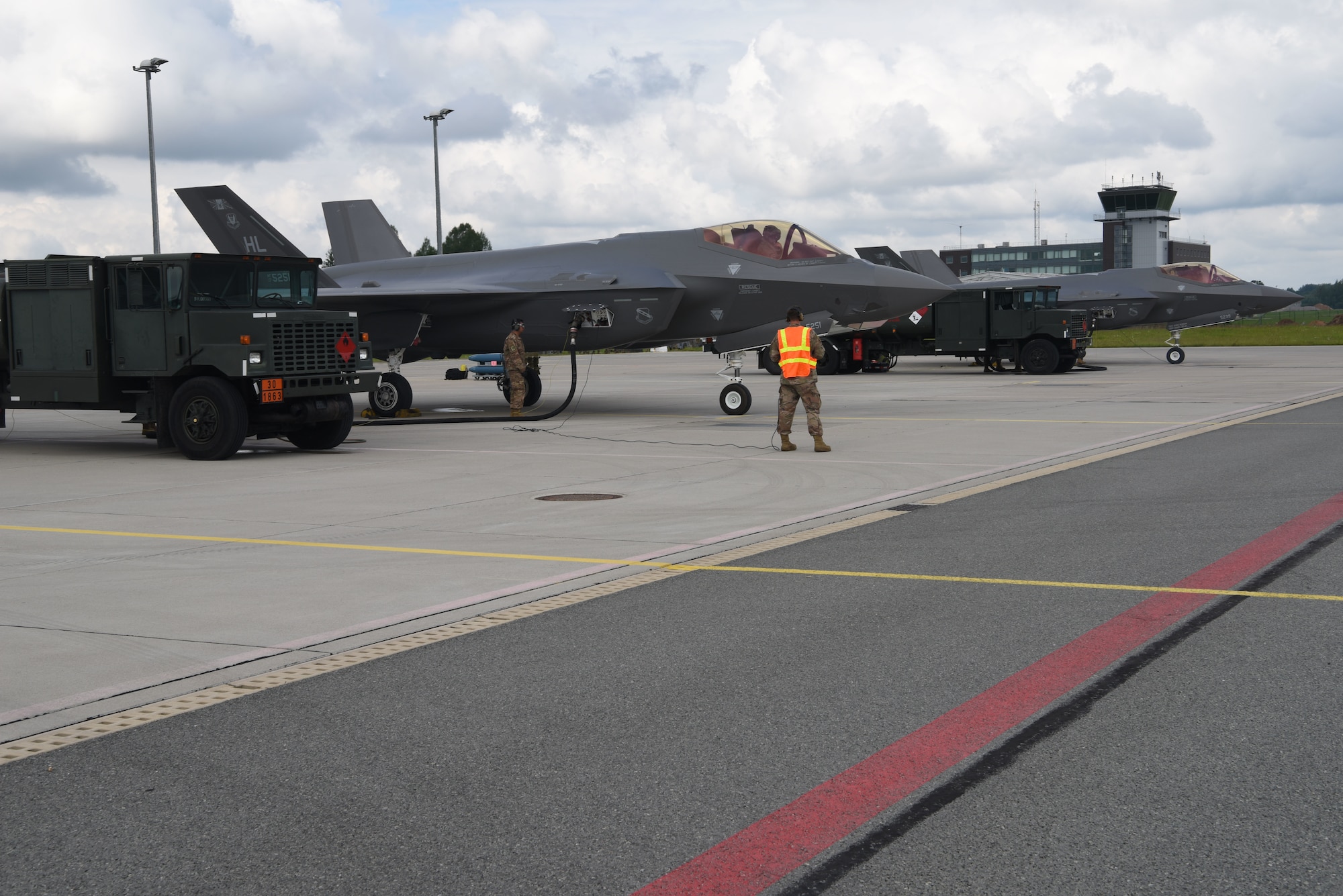 A U.S. Air Force F-35A Lightning II fighter jet deployed from the 388th and 419th Fighter Wings, Hill Air Force Base, Utah, conducts a hot pit refueling during Operation Rapid Forge at Lielvarde Air Base, Latvia, July, 23, 2019. This is the first time a U.S. Air Force F-35 Lightning II stealth fighter has landed in Latvia. Operation Rapid Forge is intended to enhance interoperability with NATO allies to improve combined operational capabilities.
