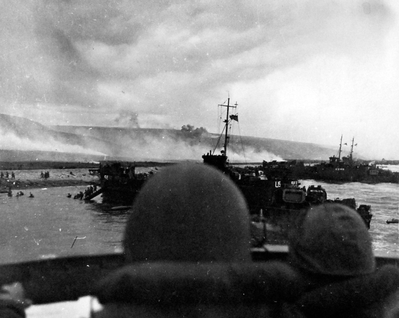 USS LCI(L)-553 and USS LCI(L)-410 land troops on Omaha Beach during initial assault on D-Day, June 6, 1944 (National Museum of the U.S. Navy/Naval History and Heritage Command)