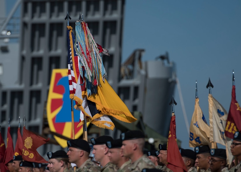 U.S. Army Soldiers assigned to the 7th Transportation Brigade (Expeditionary) raise the colors during a change of command ceremony at Joint Base Langley-Eustis, Virginia, July 18, 2019.