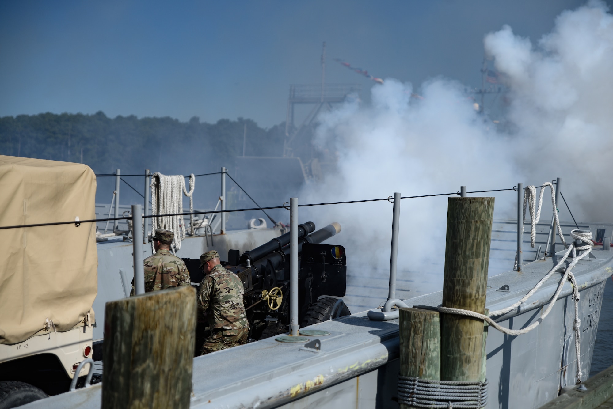 U.S. Army Soldiers assigned to the 7th Transportation Brigade (Expeditionary) fire a 105mm howitzer during a change of command ceremony at Joint Base Langley-Eustis, Virginia, July 18, 2019.
