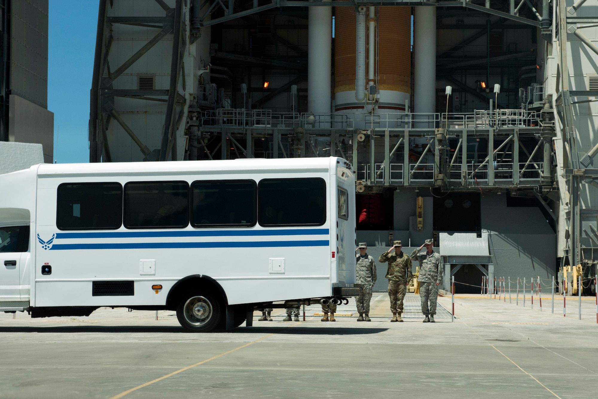 Airmen from the 45th Operations Group salute Acting Secretary of the Air Force Matthew Donovan’s surrey as it leaves Space Launch Complex-37 on July 19, 2019, at Cape Canaveral Air Force Station, Fla. Donovan visited the 45th Space Wing at Patrick Air Force Base, Fla., to become more familiar with space launch operations and attend NASA’s 50th anniversary event for the Apollo 11 mission. (U.S. Air Force photo by Airman 1st Class Zoe Thacker)