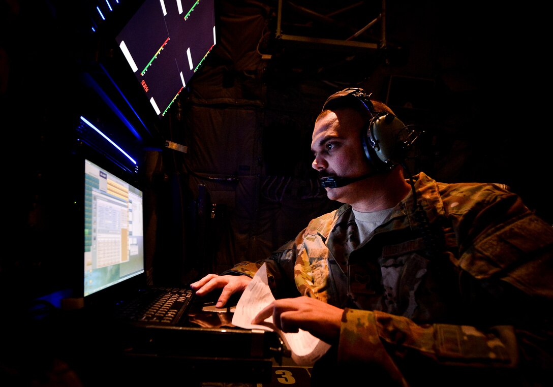 EC-130J Commando Solo systems operator monitors broadcast during mission in support of Operation Inherent Resolve at undisclosed location in Southwest Asia, September 5, 2017 (U.S. Air Force/Michael Battles)